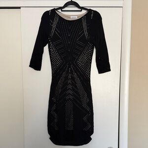 Beautiful Calvin Klein black  dress with a nude underlay